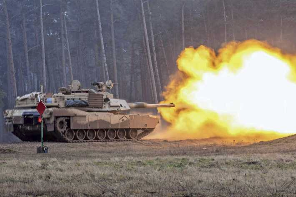Amerikaanse troepen in een Abrams tank tijdens een oefening in Polen februari dit jaar.