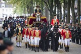 thumbnail: De Glazen Koets onderweg van de Ridderzaal naar paleis Noordeinde op Prinsjesdag.